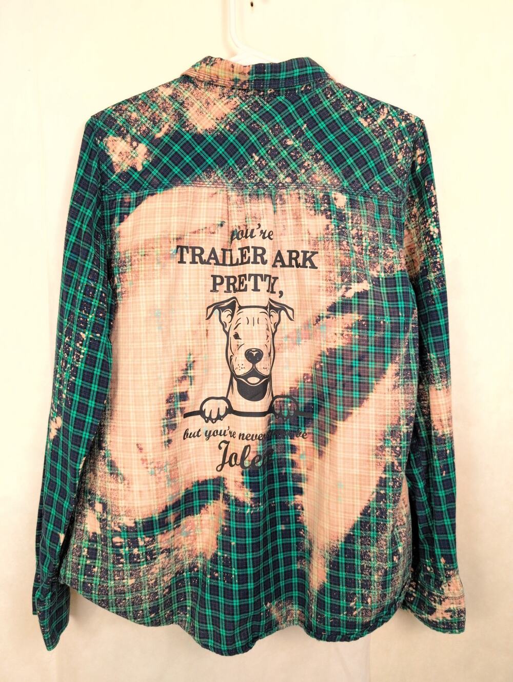 "You're trailer park pretty but you'll never be Jolene," plaid button up top Med